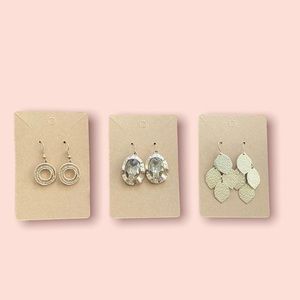 Three pairs gold tone dangle earrings